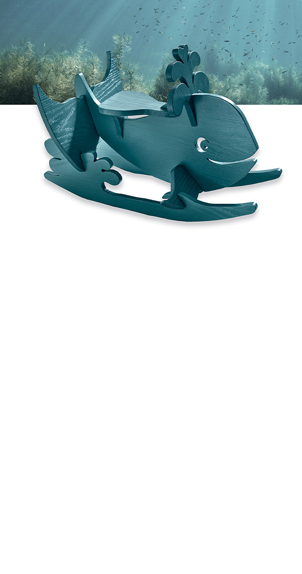 Under water with whale kids toy.