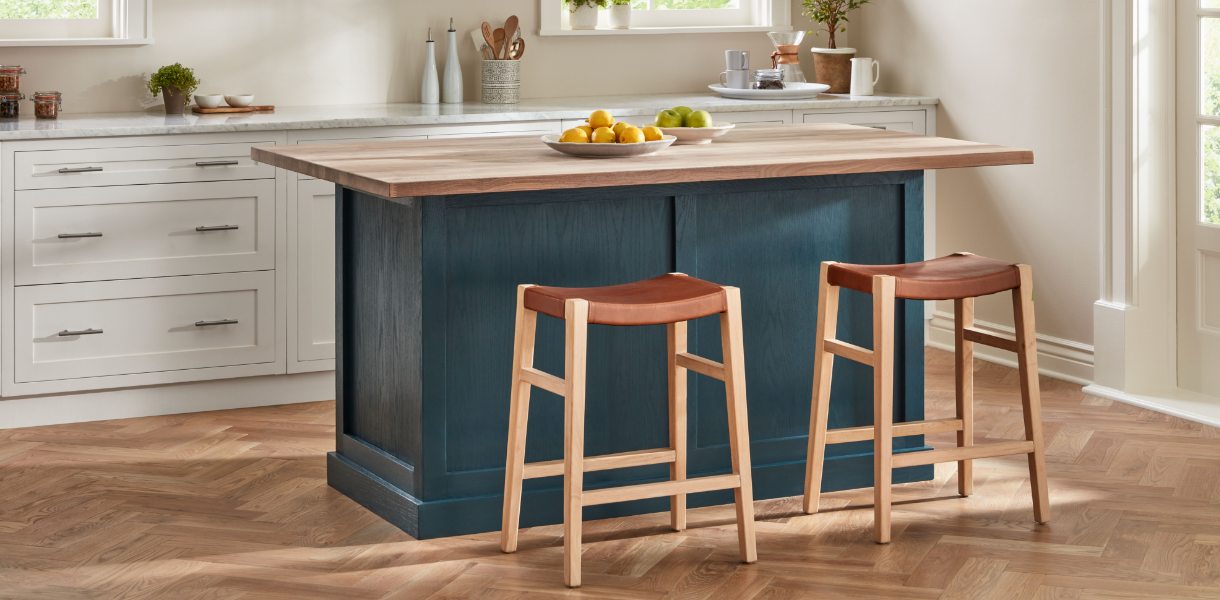 kitchen bar stained blue with stools