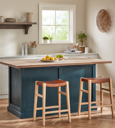kitchen bar stained blue with stools